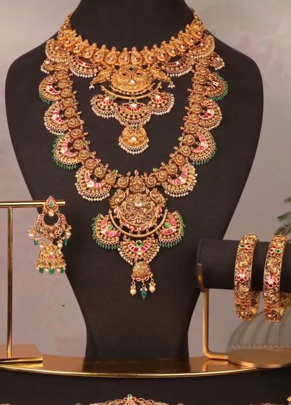 Bridal temple set with haram, jhumkas, kangan and vaddanam